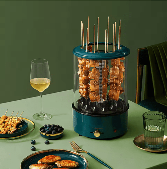 Bazaar E Arab electric rotating grill with adjustable heat controls and stainless steel cooking surface.